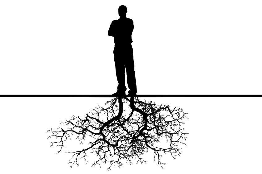 the person with roots from feet on a white background